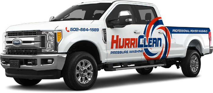 A white HurriClean Pressure Washing & Sealing Service Truck wrapped with company branded graphics.