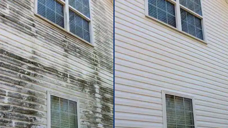 Side-by-side before & after images of a home's white vinyl siding in Crestwood, KY demonstrating the mold & mildew removing power of HurriClean's House Soft Washing service.