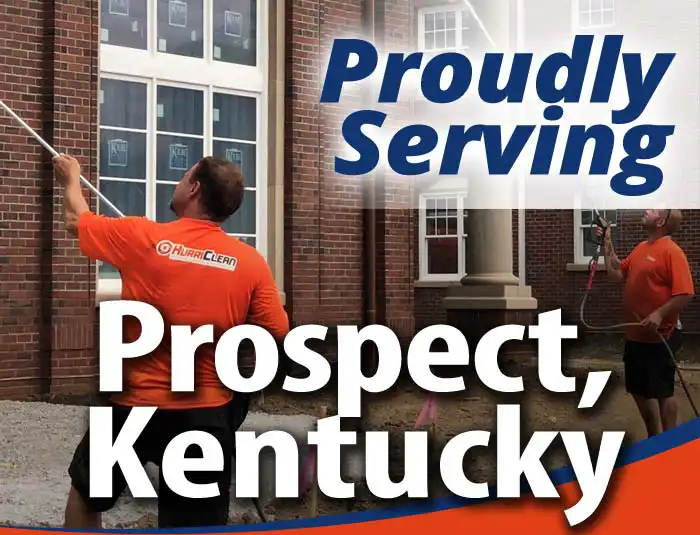 HurriClean building washing technicians wearing bright orange company shirts soft washing a brick facade with overlaid text that reads 'Proudly Serving Prospect, Kentucky'.